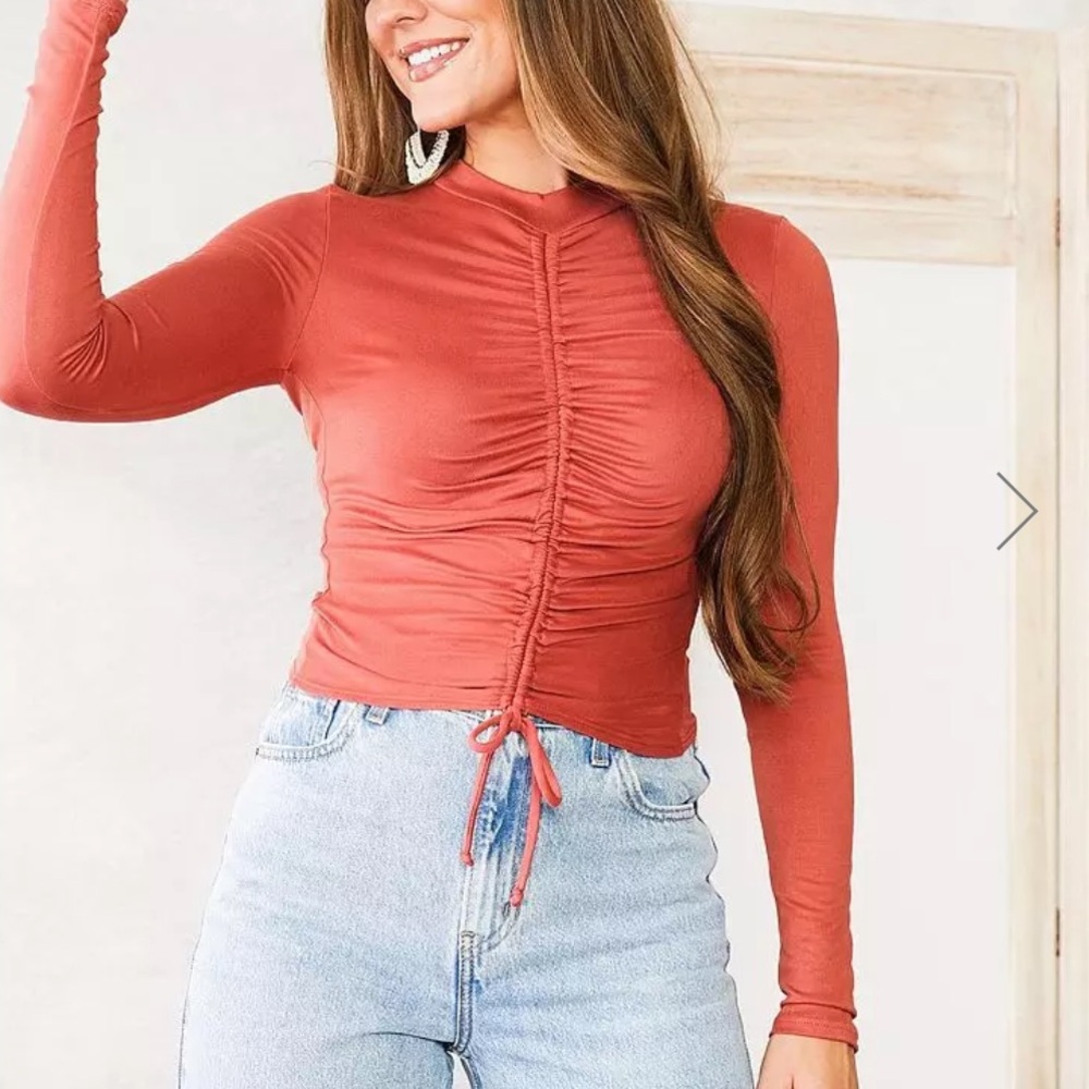 Burnt orange long sleeve top